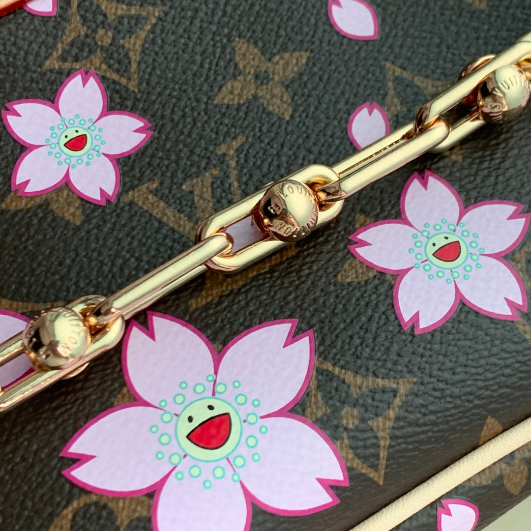 Pochette Accessoires LV x TM 22 cm en toile monogrammée Sakura marron cerisier en fleurs