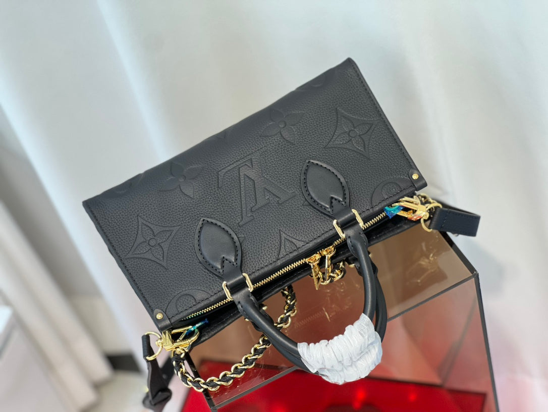 onthego 25 est ouest noir monogramme empreinte