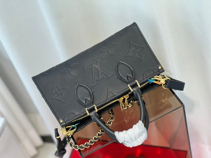 onthego 25 est ouest noir monogramme empreinte
