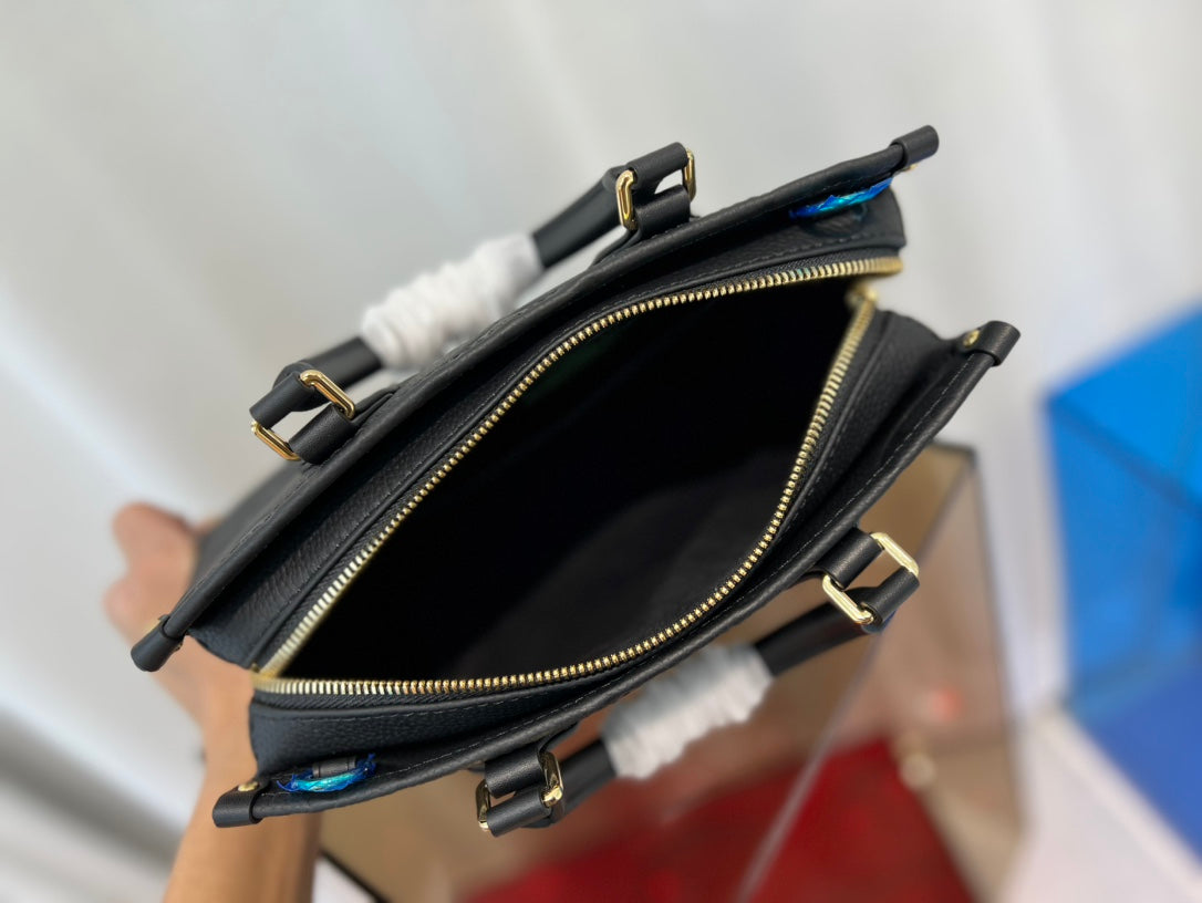 onthego 25 est ouest noir monogramme empreinte