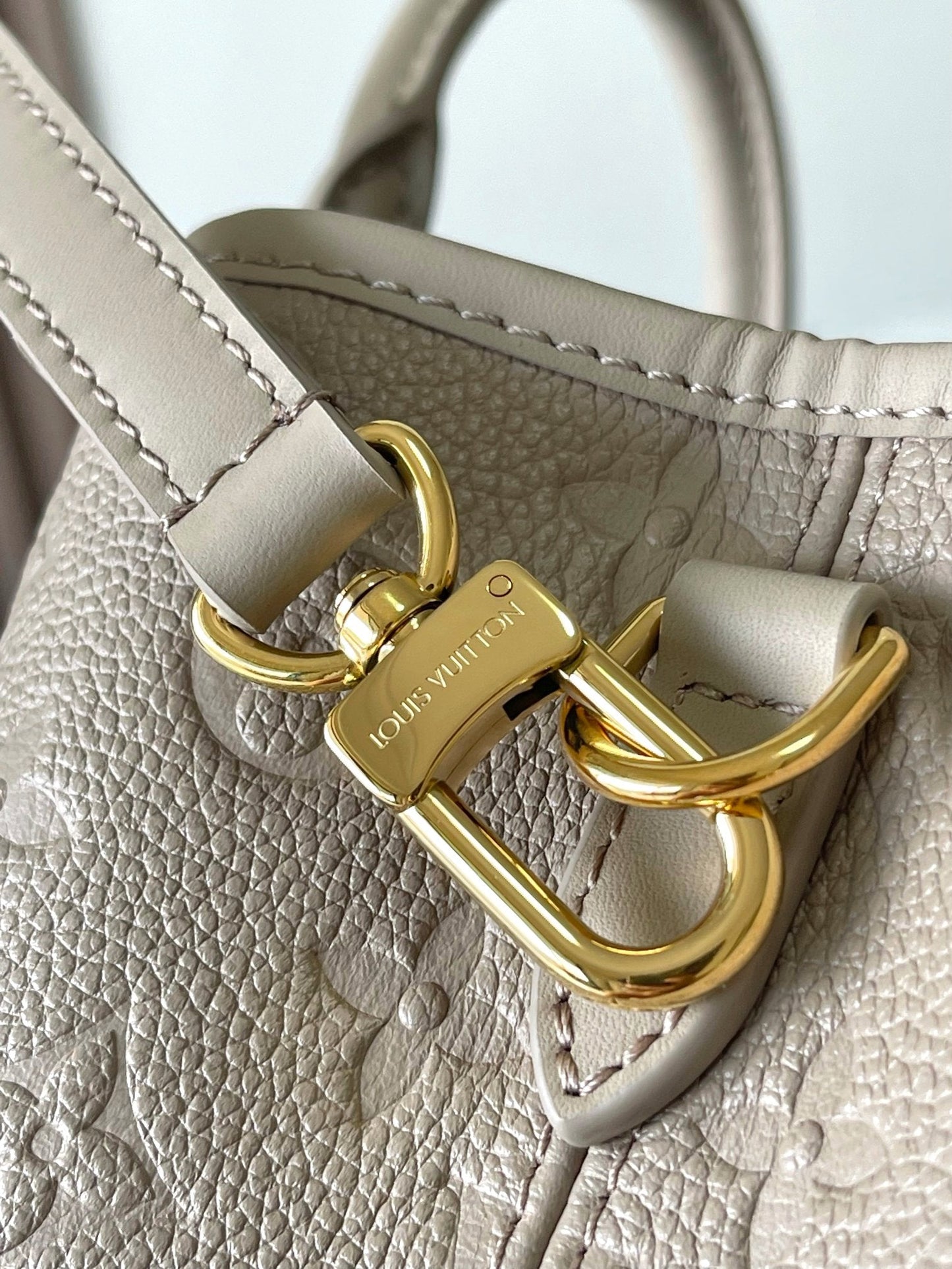 SAC BABYLONE 31 EN CUIR MONOGRAMME TOURTERELLE EMPREINTE