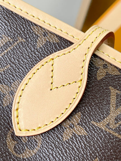 Neverfull MM 31 réversible à l'envers doré 