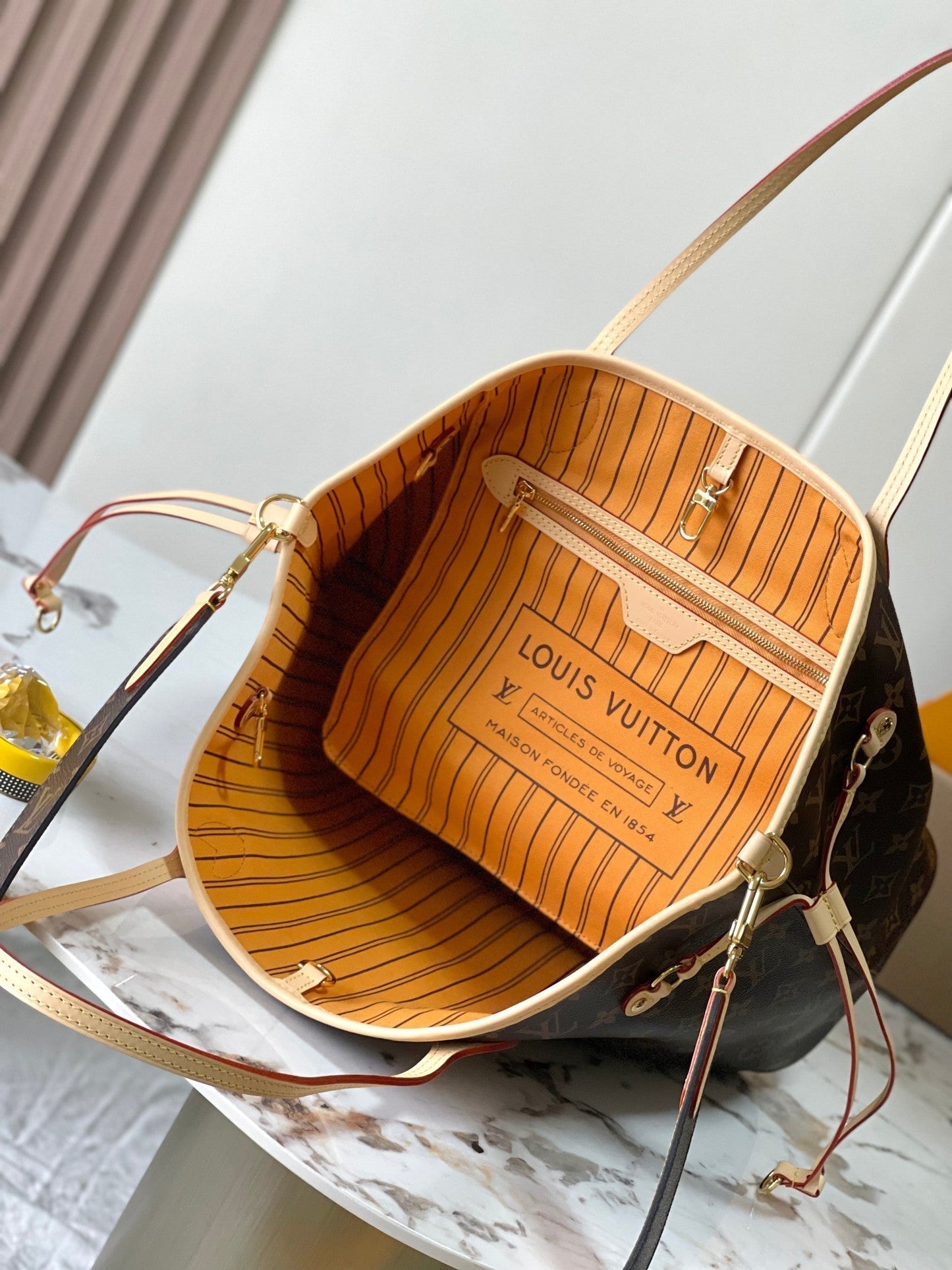 Neverfull MM 31 réversible à l'envers doré 