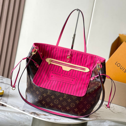 Sac réversible Neverfull MM 31 avec poignée rose foncé et intérieur extérieur 