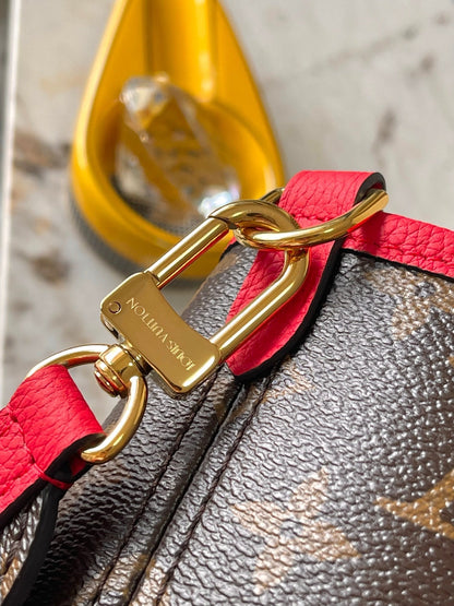 Réversible Neverfull MM 31 à l'envers avec poignée rouge 