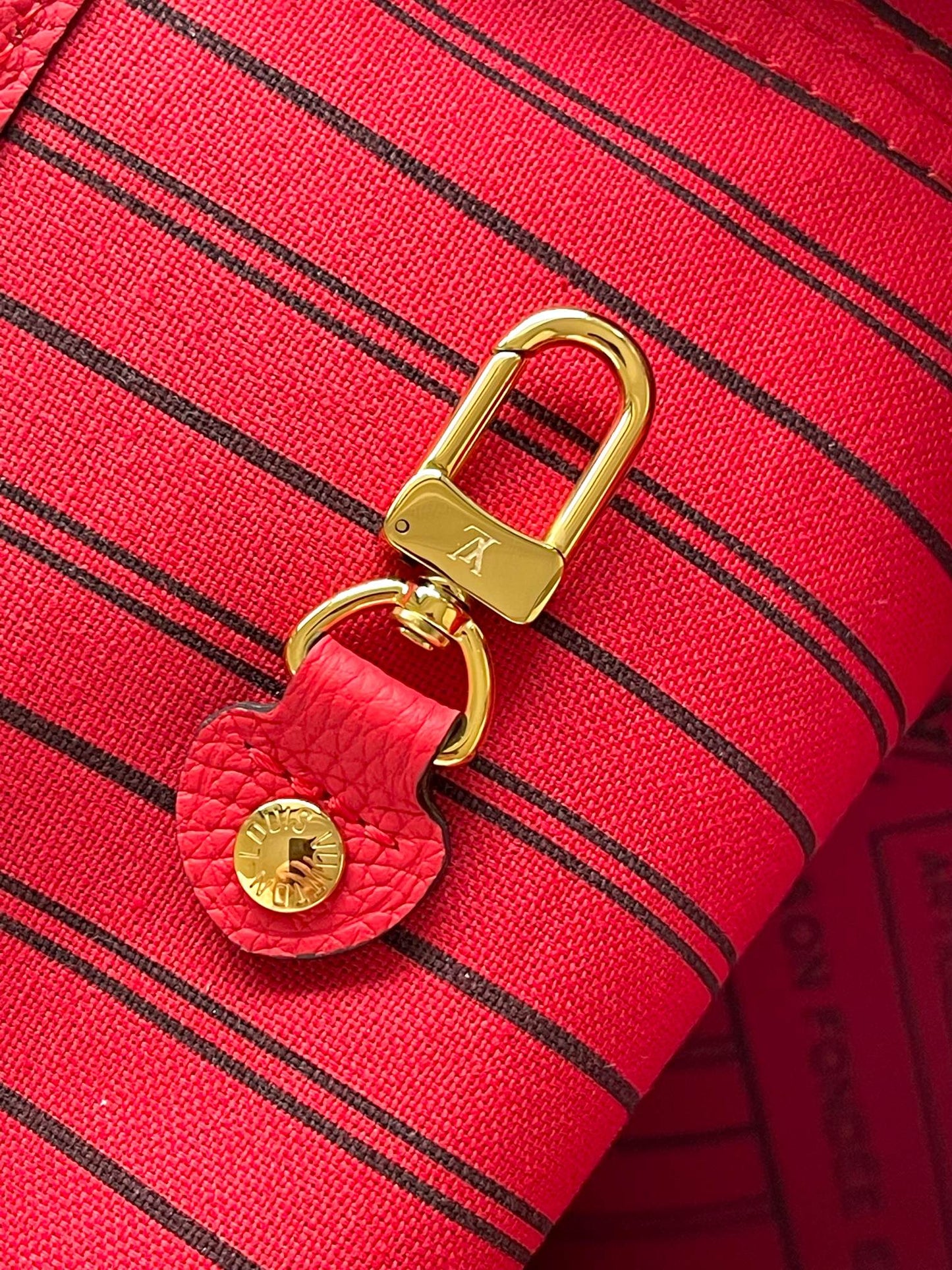 Réversible Neverfull MM 31 à l'envers avec poignée rouge 