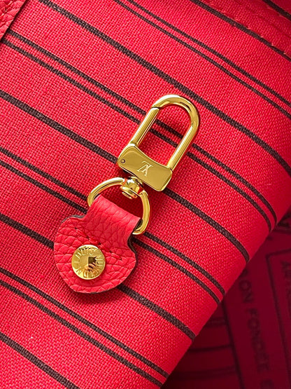 Réversible Neverfull MM 31 à l'envers avec poignée rouge 