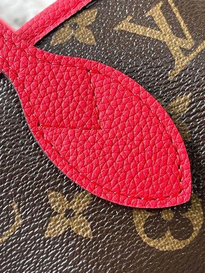 Réversible Neverfull MM 31 à l'envers avec poignée rouge 