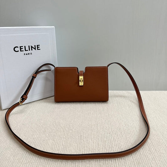 POCHETTE 16 BANDES 18 EN CUIR DE VEAU SOUPLE ORANGE BRONZE QUINCAILLERIE DORÉ