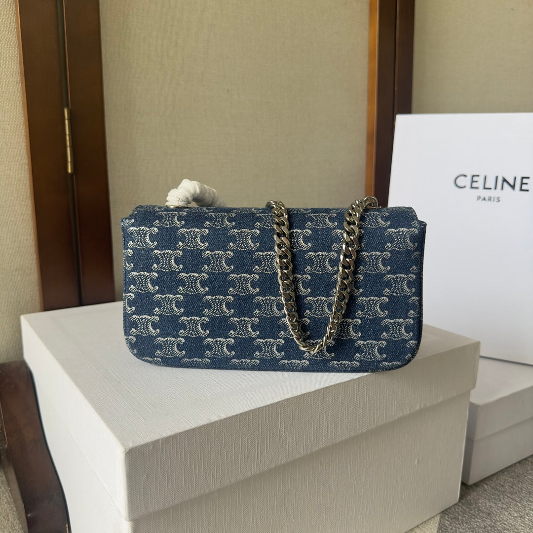 SAC À BANDOULIÈRE CHAÎNE CLAUDE 20 EN DENIM BLEU BAYOUX TRIOMPHE QUINCAILLERIE ARGENTÉE