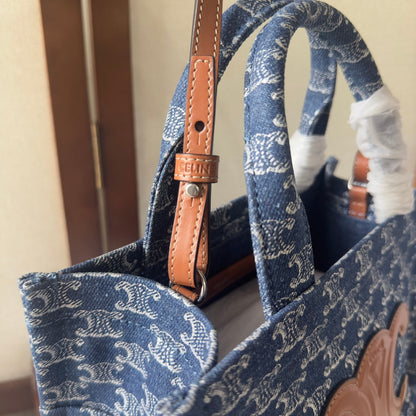 PETIT CABAS THAÏS 25 EN DENIM TRIOMPHE BLEU BAYOUX ET CUIR DE VEAU MARRON BRONZE