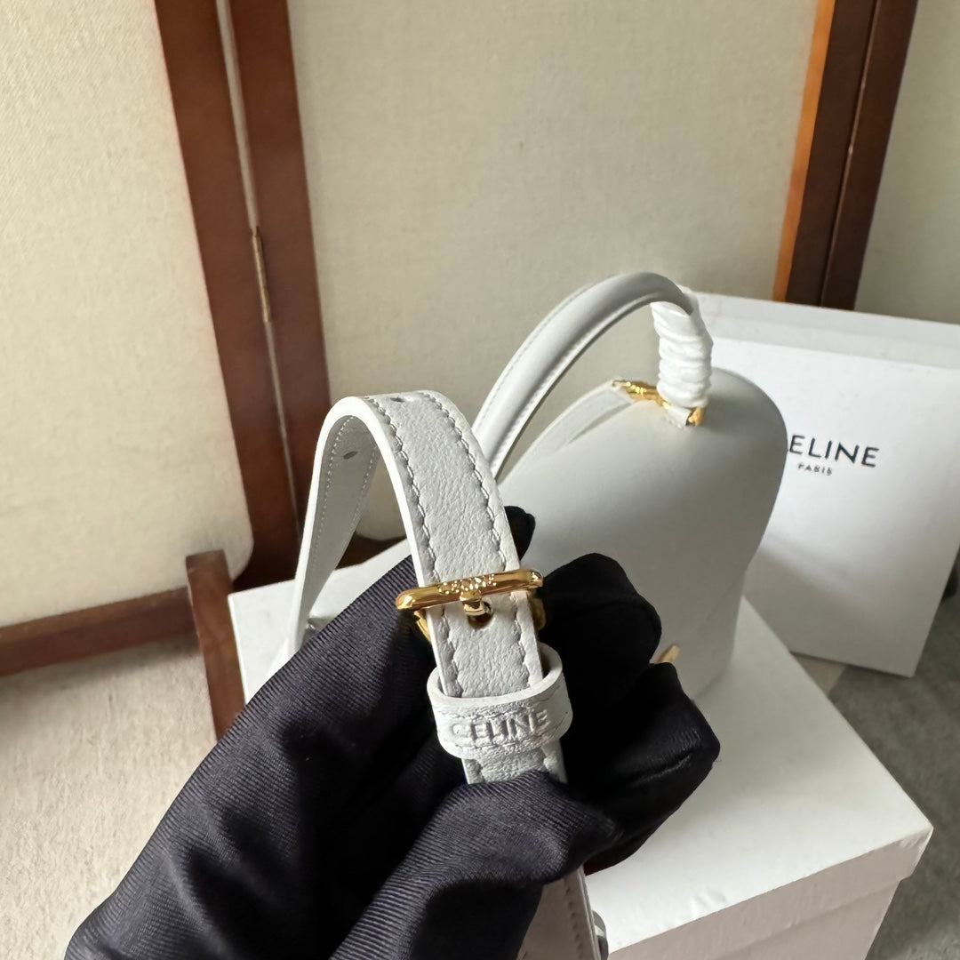 SAC NINO MOYEN 25 EN CUIR DE VEAU SOUPLE BLANC, QUINCAILLERIE DORÉE