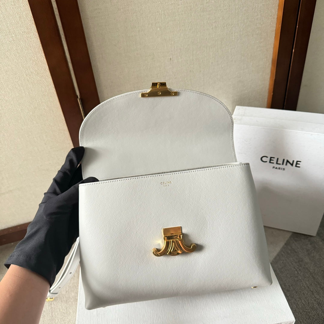 SAC NINO MOYEN 25 EN CUIR DE VEAU SOUPLE BLANC, QUINCAILLERIE DORÉE