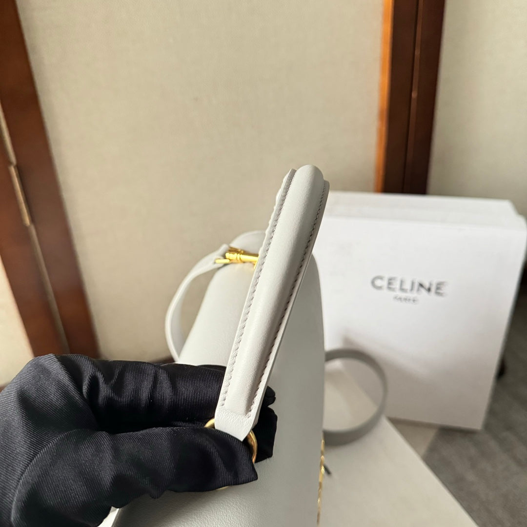 SAC NINO MOYEN 25 EN CUIR DE VEAU SOUPLE BLANC, QUINCAILLERIE DORÉE