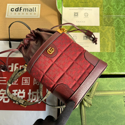 SAC SEAU 18 EN TOILE ROUGE BORDEAUX ET CUIR DE VEAU QUINCAILLERIE DORÉ