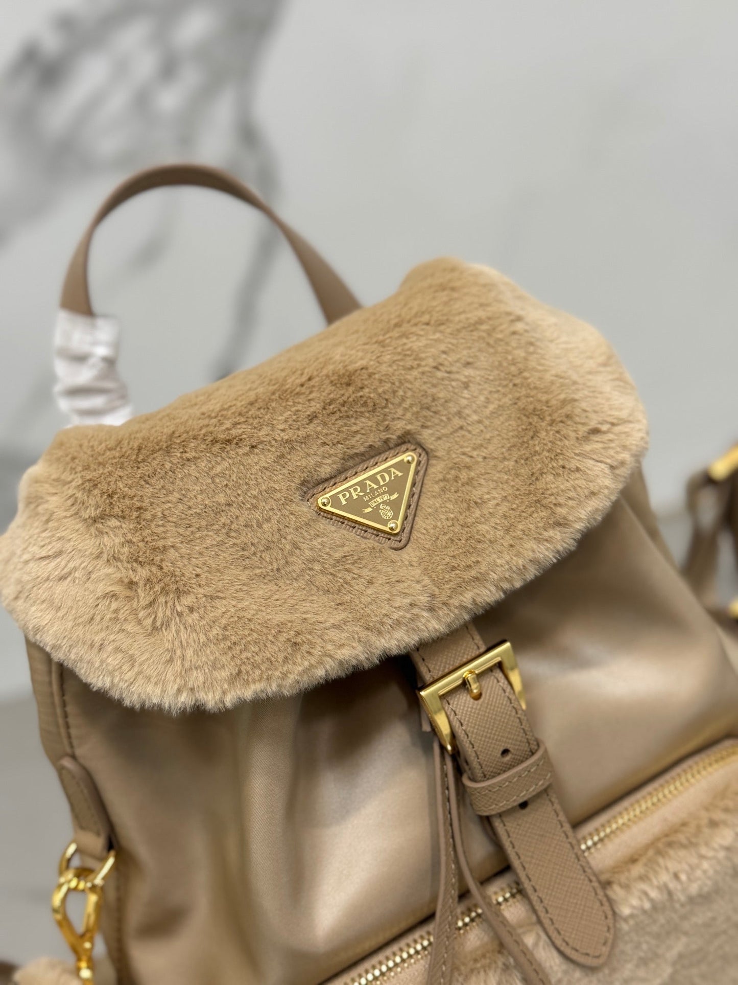SAC À DOS 25 EN TISSU PARACHUTE BEIGE ET FOURRURE DE LAPIN