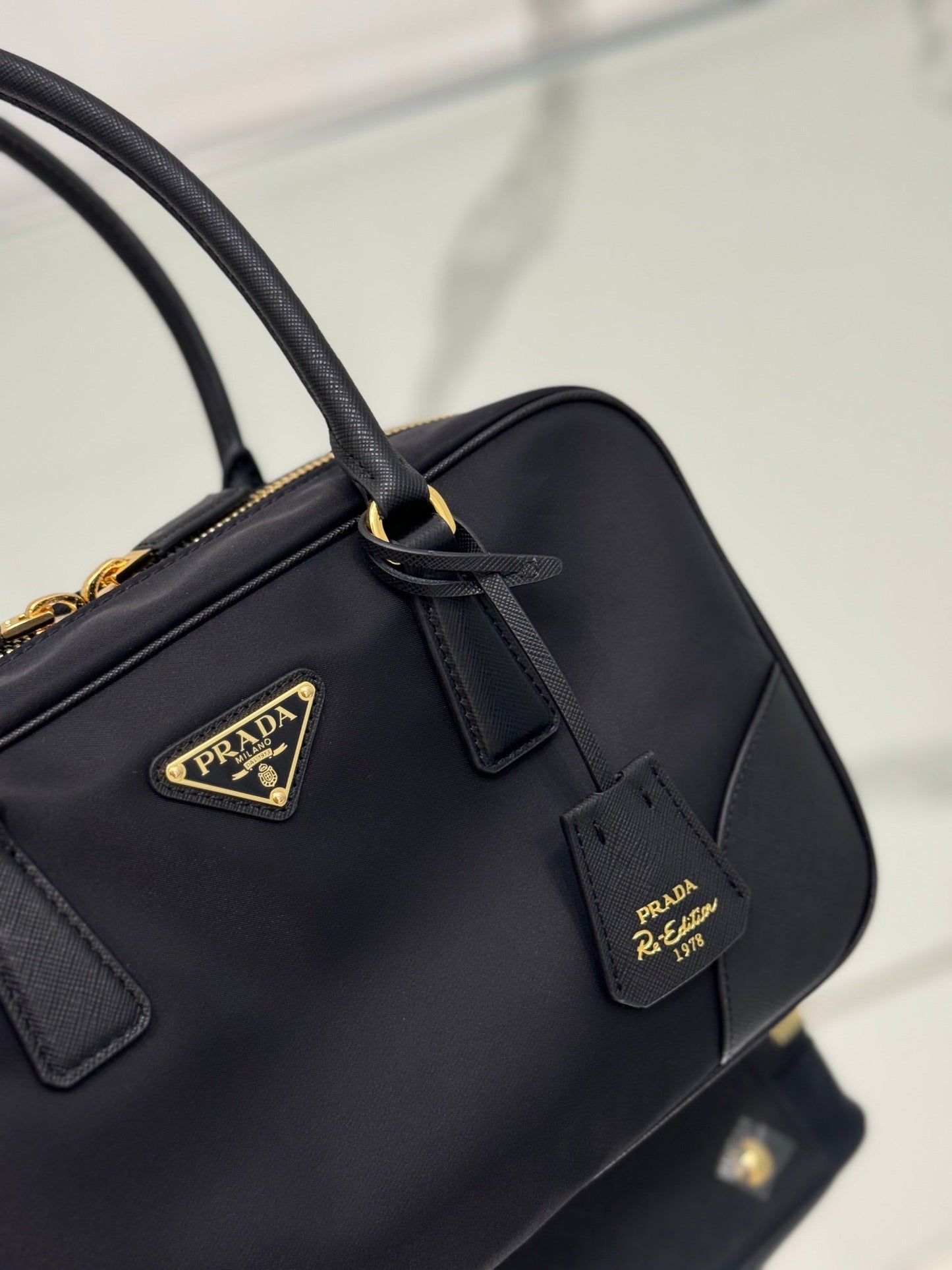 SAC À MAIN MOYEN 30 EN NYLON NOIR ET BORDURE EN CUIR DE VEAU
