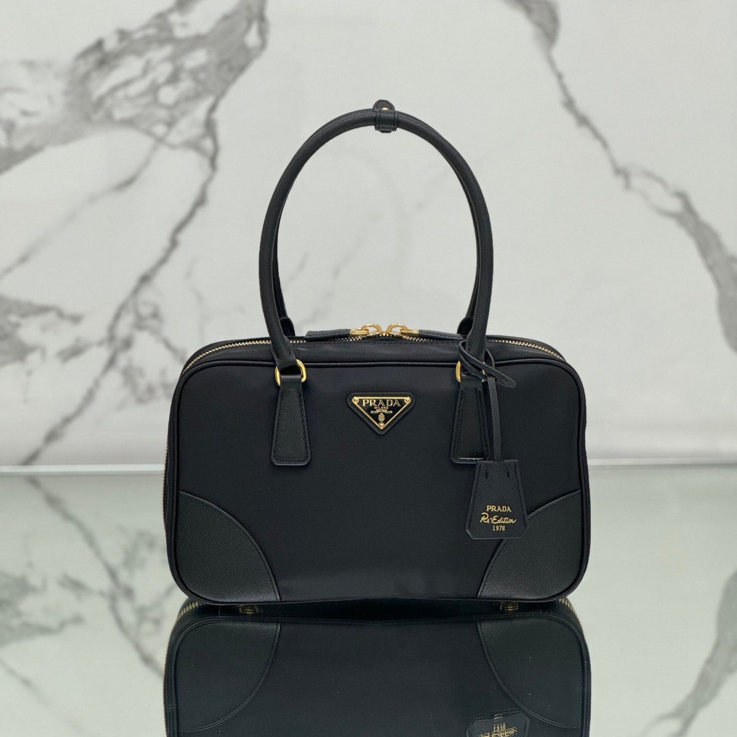 SAC À MAIN MOYEN 30 EN NYLON NOIR ET BORDURE EN CUIR DE VEAU