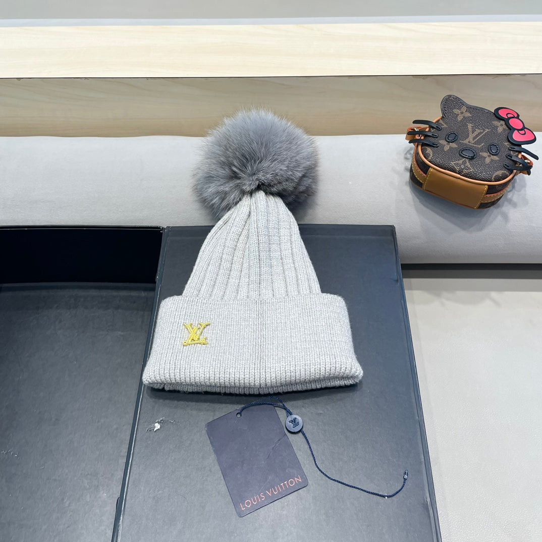 BONNET EN LAINE GRIS CLAIR ET FOURRURE DE RENARD 409791