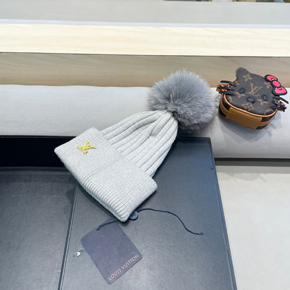 BONNET EN LAINE GRIS CLAIR ET FOURRURE DE RENARD 409791