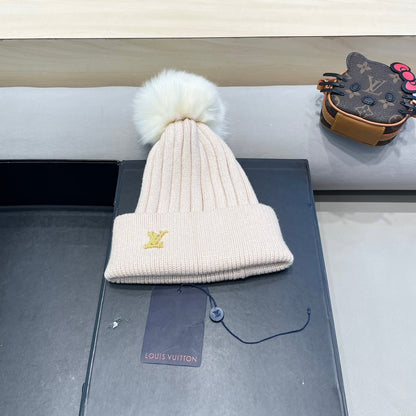 BONNET EN LAINE ROSE BERCEUSE ET FOURRURE DE RENARD 409792 