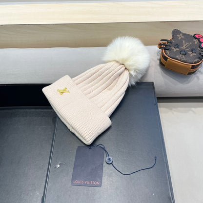 BONNET EN LAINE ROSE BERCEUSE ET FOURRURE DE RENARD 409792 