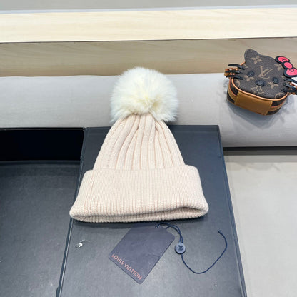 BONNET EN LAINE ROSE BERCEUSE ET FOURRURE DE RENARD 409792 