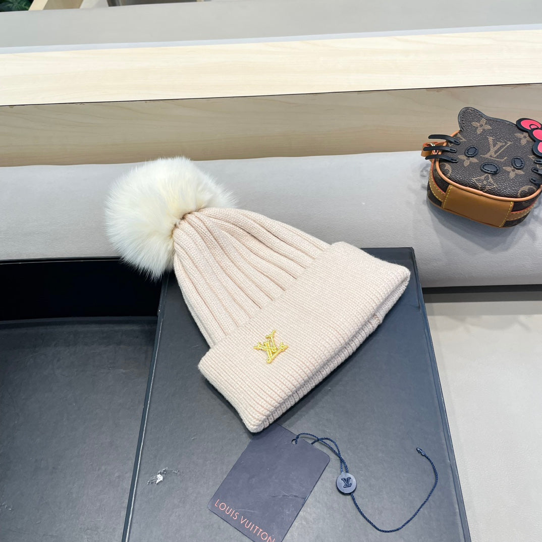 BONNET EN LAINE ROSE BERCEUSE ET FOURRURE DE RENARD 409792 