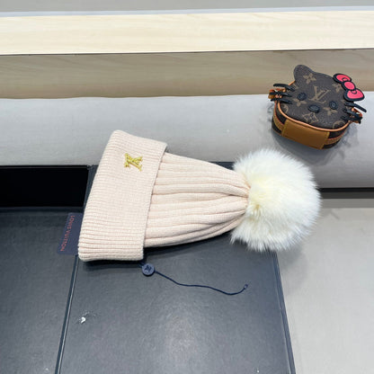 BONNET EN LAINE ROSE BERCEUSE ET FOURRURE DE RENARD 409792 