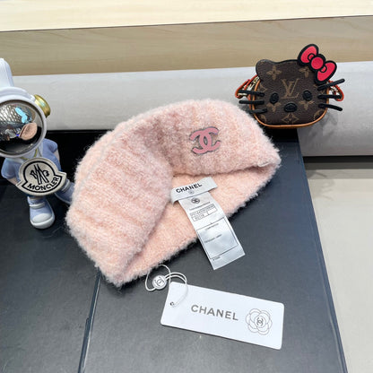 BONNET EN LAINE ROSE CLAIR 413329 