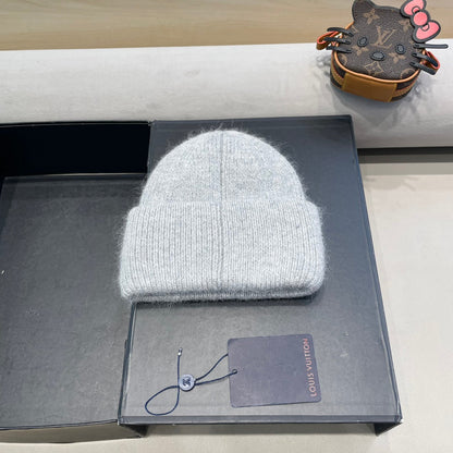 BONNET EN LAINE GRIS CLAIR ET FOURRURE DE LAPIN 417755 