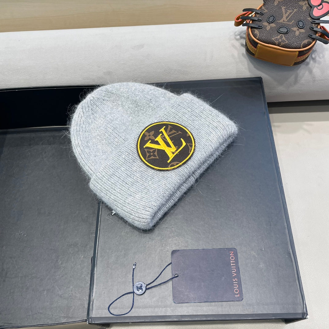 BONNET EN LAINE GRIS CLAIR ET FOURRURE DE LAPIN 417755 