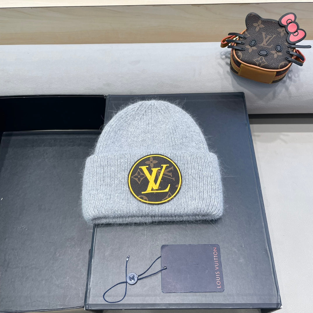 BONNET EN LAINE GRIS CLAIR ET FOURRURE DE LAPIN 417755 