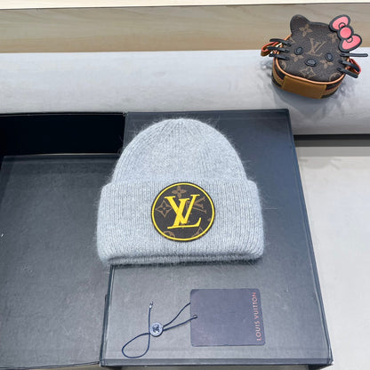 BONNET EN LAINE GRIS CLAIR ET FOURRURE DE LAPIN 417755 