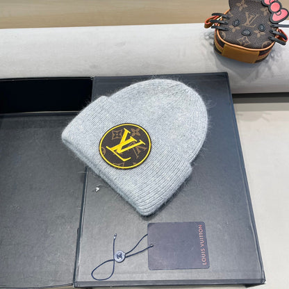 BONNET EN LAINE GRIS CLAIR ET FOURRURE DE LAPIN 417755 