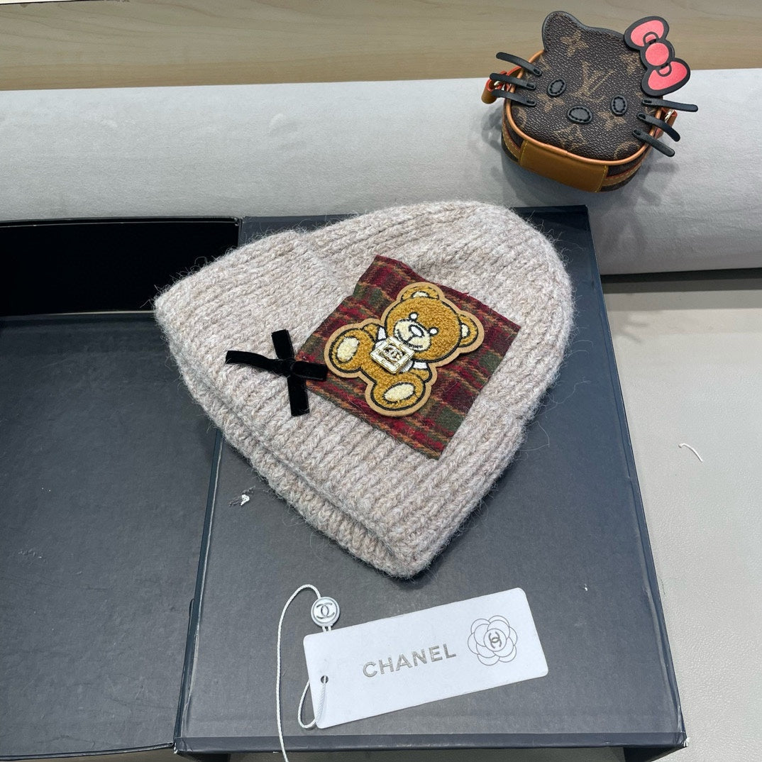 BONNET EN LAINE BEIGE CAMEL AVEC NŒUD 421255 