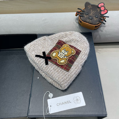 BONNET EN LAINE BEIGE CAMEL AVEC NŒUD 421255 