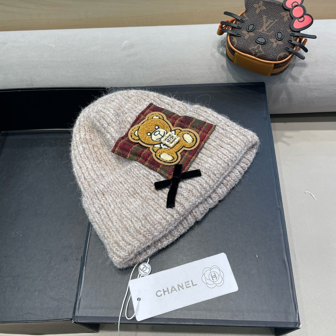 BONNET EN LAINE BEIGE CAMEL AVEC NŒUD 421255 