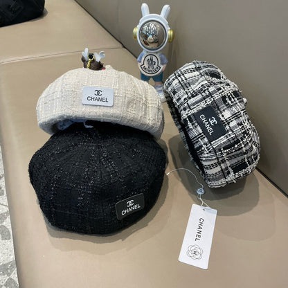 BÉRET EN TWEED DE LAINE NOIR ET BLANC 422552 