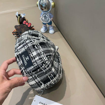 BÉRET EN TWEED DE LAINE NOIR ET BLANC 422552 
