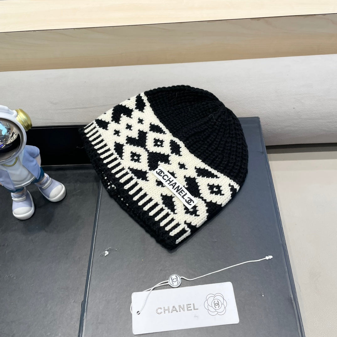 BONNET EN LAINE MÉLANGÉE NOIRE ET BLANCHE 431698 