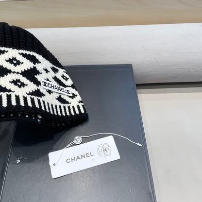 BONNET EN LAINE MÉLANGÉE NOIRE ET BLANCHE 431698 