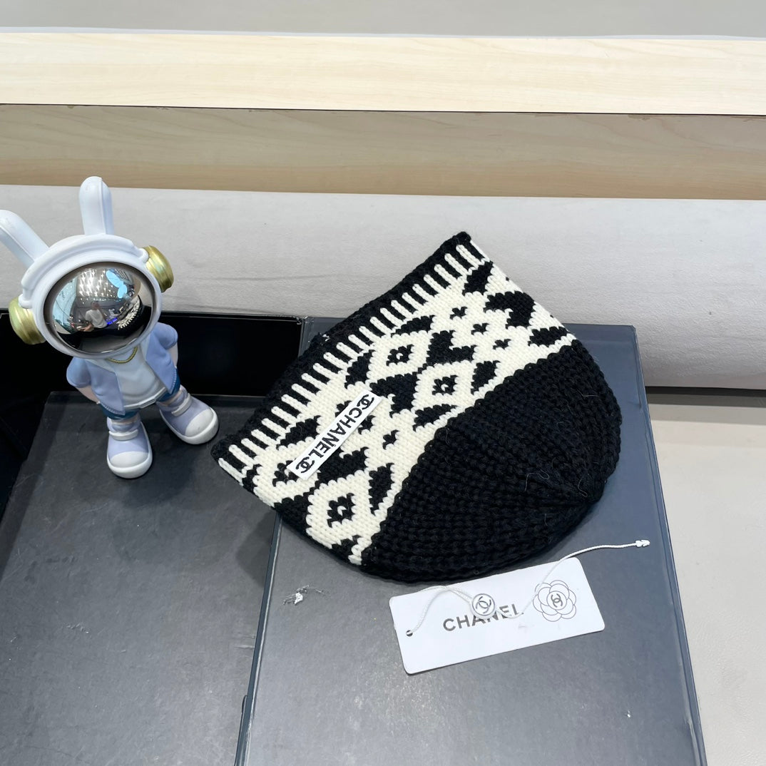 BONNET EN LAINE MÉLANGÉE NOIRE ET BLANCHE 431698 