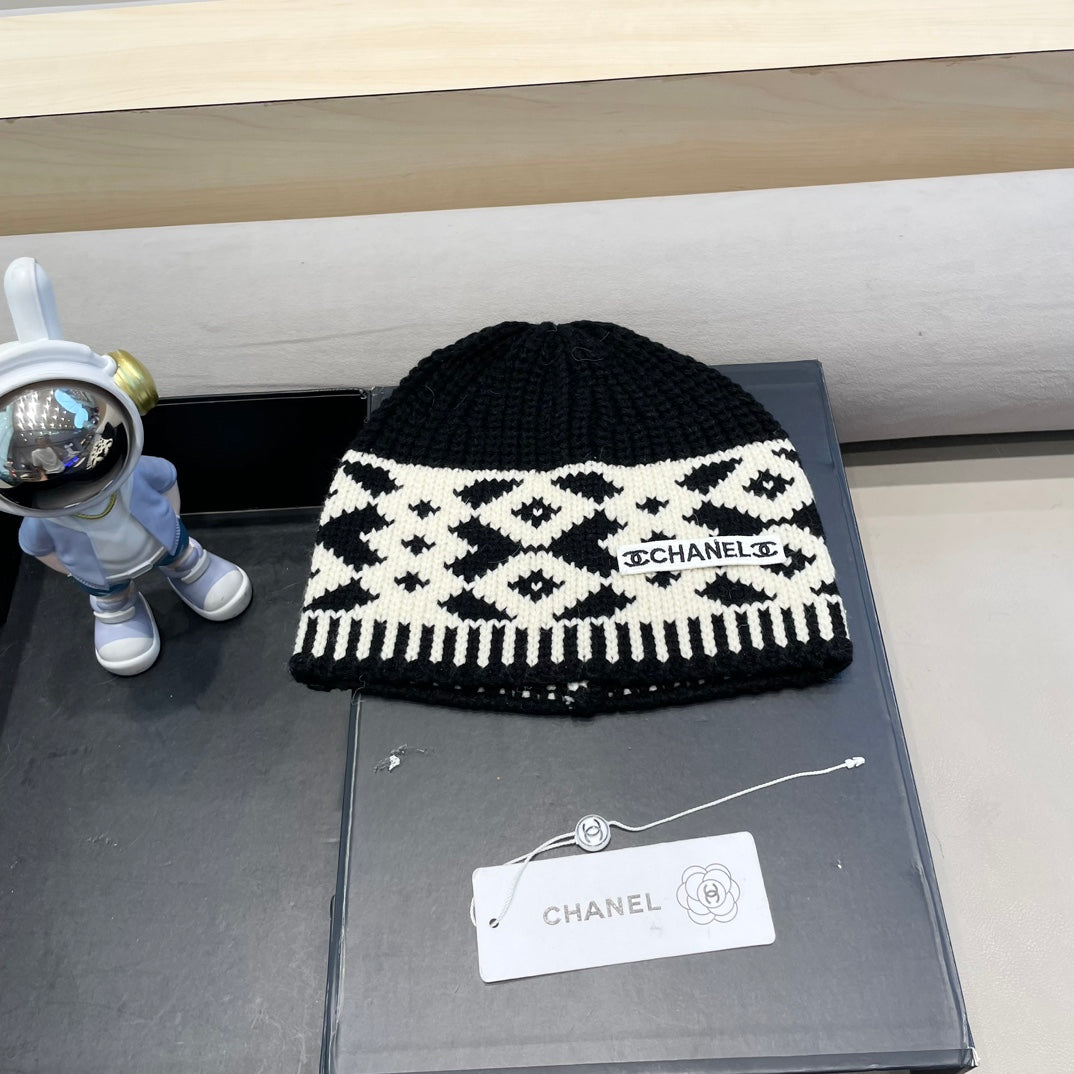 BONNET EN LAINE MÉLANGÉE NOIRE ET BLANCHE 431698 