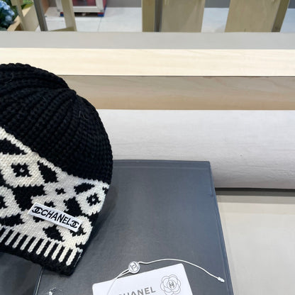 BONNET EN LAINE MÉLANGÉE NOIRE ET BLANCHE 431698 