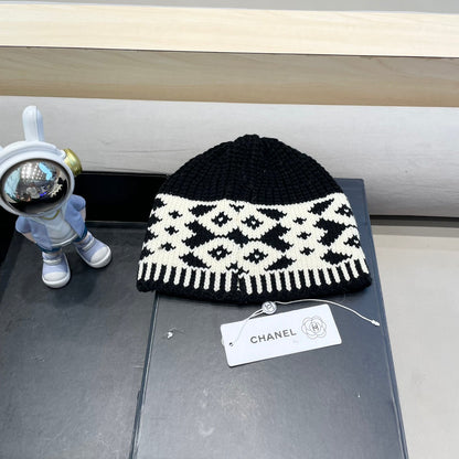 BONNET EN LAINE MÉLANGÉE NOIRE ET BLANCHE 431698 