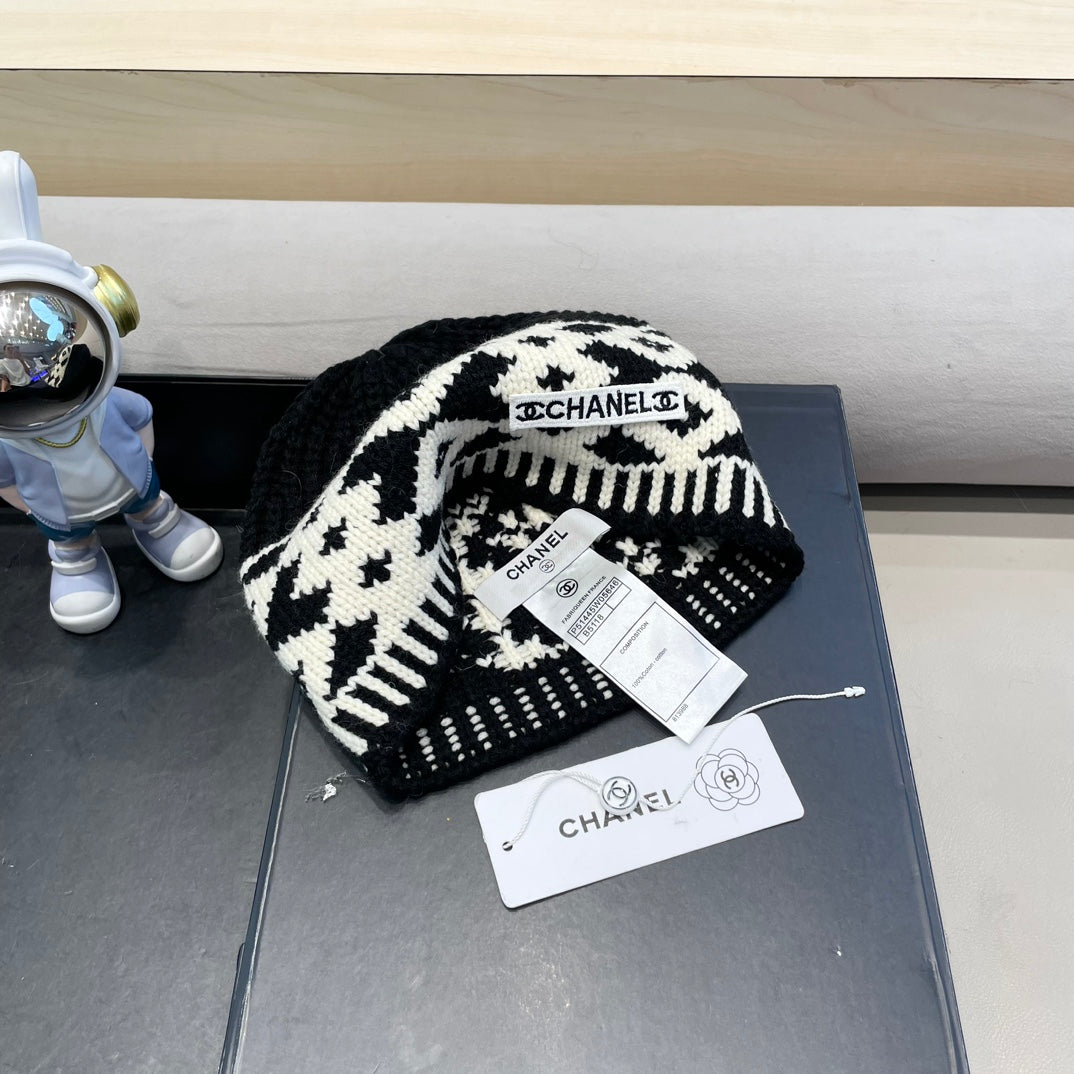 BONNET EN LAINE MÉLANGÉE NOIRE ET BLANCHE 431698 