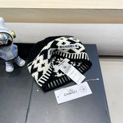 BONNET EN LAINE MÉLANGÉE NOIRE ET BLANCHE 431698 