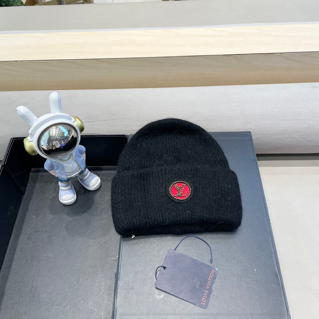 BONNET EN LAINE NOIRE ET FOURRURE DE LAPIN 433473 