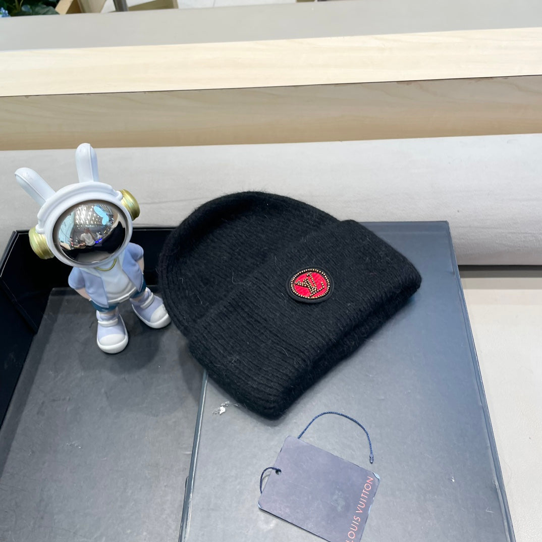 BONNET EN LAINE NOIRE ET FOURRURE DE LAPIN 433473 